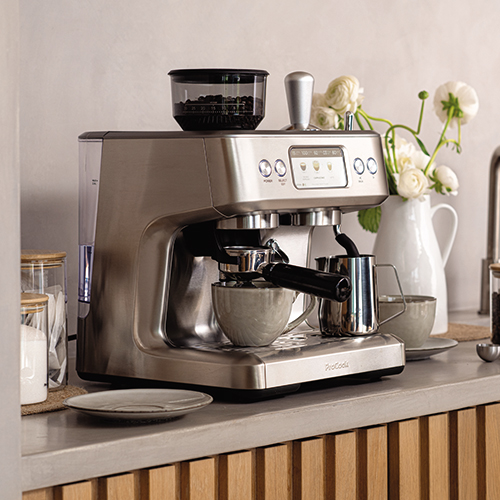 ProCook coffee machine sitting on an office kitchen table