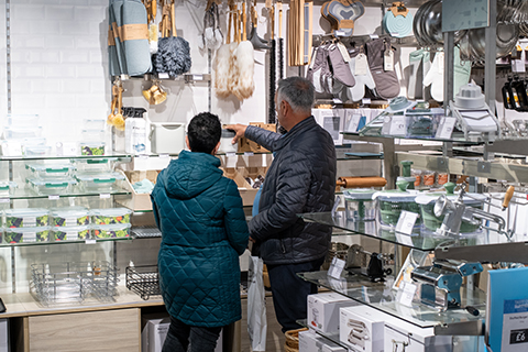 Two customers picking out an item in a ProCook store